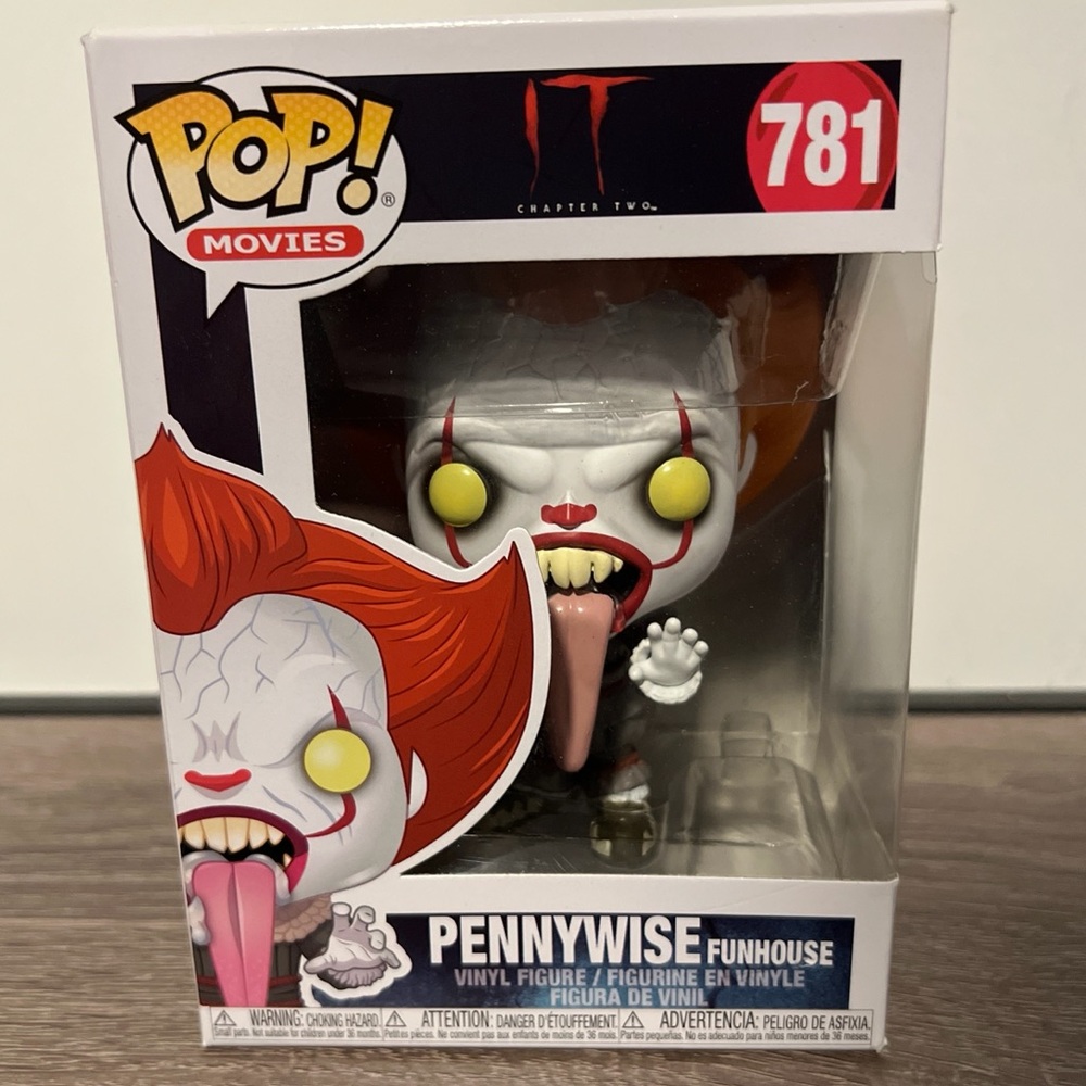 Funko Pennywise Vinyl Figure with Red Hair and Yellow Eyes
